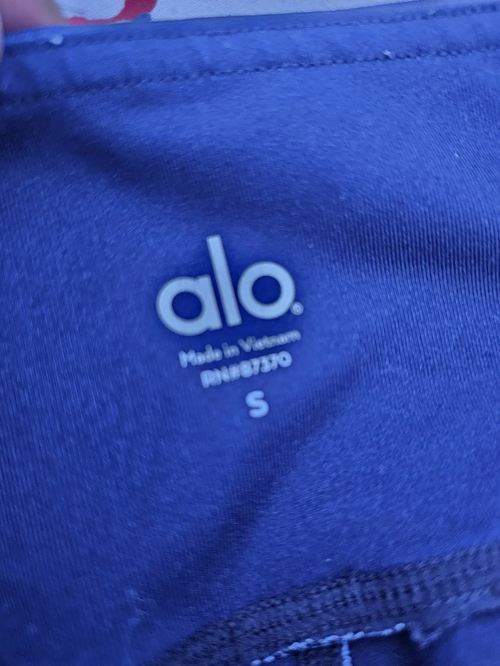 ALO Yoga Navy Leggings with Vibrant Blue Feather Print